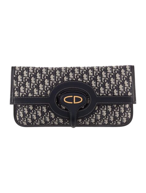 dior oblique fold over clutch|Dior cannage clutch.